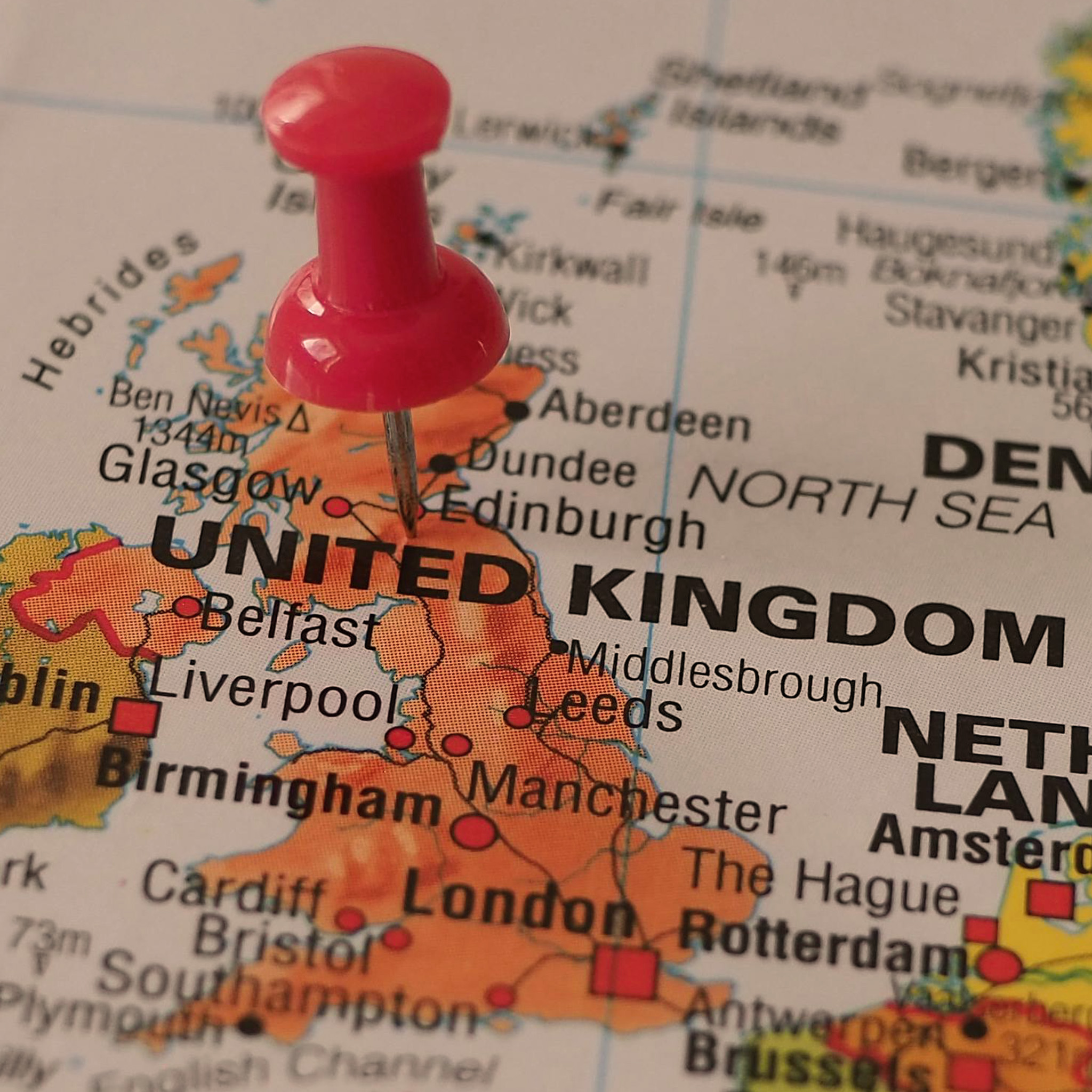 Map of the British Isles with a Pin.